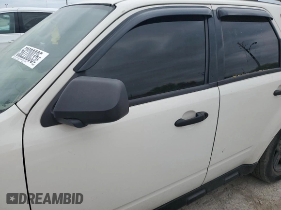 2009 Ford Escape Hybrid with VIN 1FMCU493X9KC01844, listed as a Copart auction lot 58220035 with Not provided miles and Salvage title. Bid and sale history available at DreamBid. Image 7.