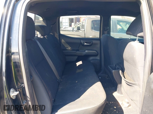 2017 Toyota Tacoma SR5 with VIN 5TFAZ5CN8HX052459, listed as a IAAI auction lot 41495281 with 212,314 mi miles and . Bid and sale history available at DreamBid. Image 8.