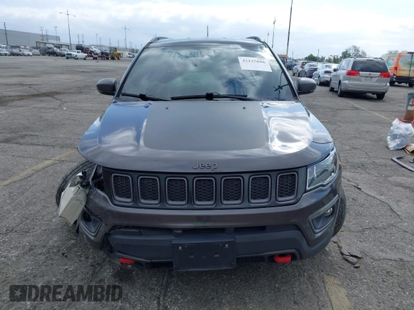 2021 Jeep Compass Trailhawk with VIN 3C4NJDDB6MT561074, listed as a IAAI auction lot 42125886 with 77,293 mi miles and . Bid and sale history available at DreamBid. Image 13.