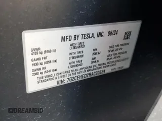 2024 Tesla Cybertruck z VIN 7G2CEHED2RA020834, wystawiony jako Copart lot #73682154 z przebiegiem 9221 mil mil oraz Szkody całkowita. Historia ofert i sprzedaży dostępna na DreamBid. Obrazek 14.