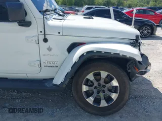 2019 Jeep Wrangler Unlimited Sahara with VIN 1C4HJXEG4KW514206, listed as a IAAI auction lot 42247094 with 45,712 mi miles and . Bid and sale history available at DreamBid. Image 6.