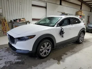 2021 Mazda CX-30 Premium with VIN 3MVDMBDL7MM209257, listed as a Copart auction lot 52368755 with 76,677 mi miles and Salvage title. Bid and sale history available at DreamBid. Image 1.
