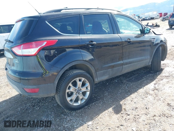 2013 Ford Escape SEL with VIN 1FMCU9H93DUB56102, listed as a IAAI auction lot 41809309 with 60,498 mi miles. Bid and sale history available at carsss.com. Image 4.