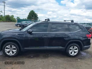 2018 Volkswagen Atlas SEL z VIN 1V2MR2CA2JC516351, wystawiony jako IAAI lot #42341113 z przebiegiem 135 077 mil mil oraz . Historia ofert i sprzedaży dostępna na DreamBid. Obrazek 14.