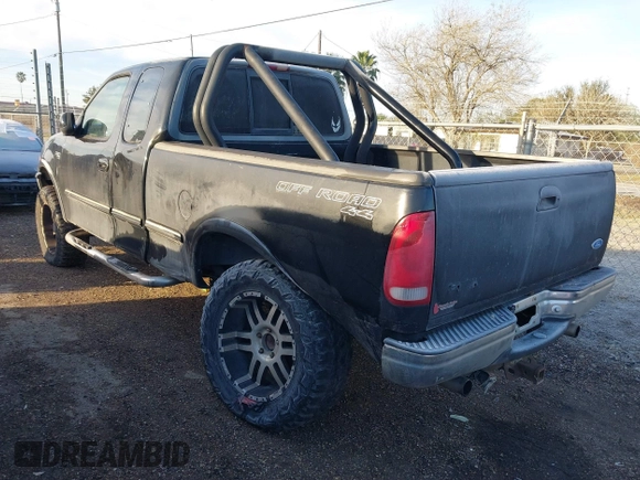 1997 Ford F-150 XL with VIN 1FTDX18W1VNB21383, listed as a IAAI auction lot 41378608 with 155,453 mi miles. Bid and sale history available at carsss.com. Image 3.