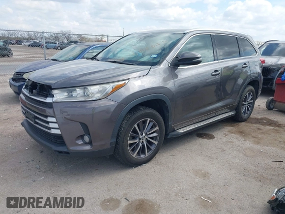 2018 Toyota Highlander SE with VIN 5TDKZRFH9JS544012, listed as a IAAI auction lot 41885296 with 144,500 mi miles and . Bid and sale history available at DreamBid. Image 2.