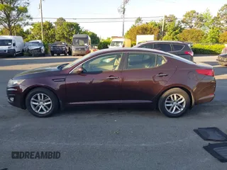 2013 Kia Optima LX with VIN 5XXGM4A71DG124725, listed as a IAAI auction lot 42041768 with 184,181 mi miles and . Bid and sale history available at carsss.com. Image 14.