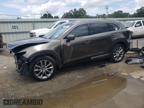 2018 Mazda CX-9 Grand Touring с VIN JM3TCADY9J0205299, выставлен на аукционе Copart как лот 60306095 с пробегом 113 766 миль миль и Списание • Salvage title. История ставок и продаж доступна на DreamBid. Изображение 1.