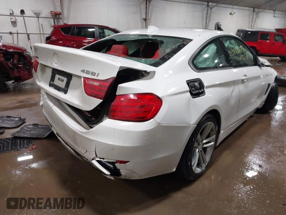 2015 BMW 4 Series 428i xDrive z VIN WBA3N9C52FK246245, wystawiony jako IAAI lot #41650714 z przebiegiem 142 776 mil mil oraz . Historia ofert i sprzedaży dostępna na DreamBid. Obrazek 4.