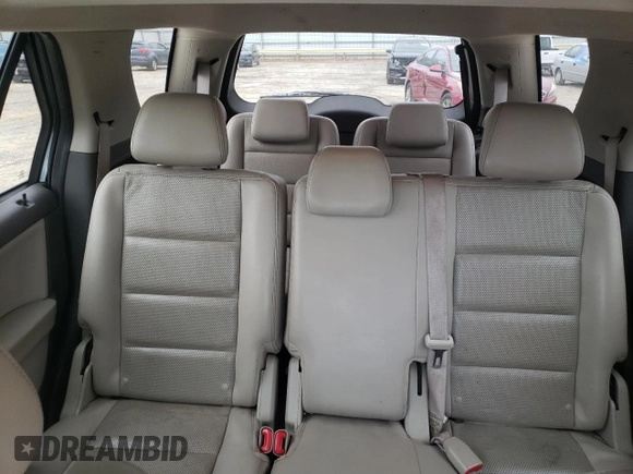2009 Ford Taurus X Limited with VIN 1FMDK03W89GA01358, listed as a Copart auction lot 79132254 with 173,623 mi miles and Salvage title. Bid and sale history available at DreamBid. Image 10.