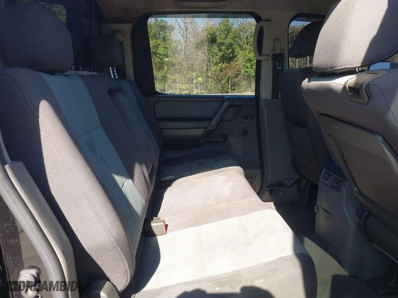 2007 Nissan Titan LE with VIN 1N6BA07B87N216508, listed as a IAAI auction lot 41595615 with 291,489 mi miles. Bid and sale history available at carsss.com. Image 8.
