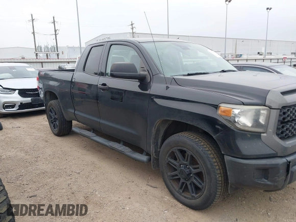 2019 Toyota Tundra SR with VIN 5TFRM5F1XKX143105, listed as a IAAI auction lot 41274567 with 180,602 mi miles and . Bid and sale history available at DreamBid. Image 14.