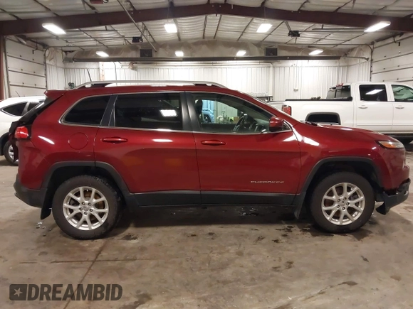 2016 Jeep Cherokee Latitude with VIN 1C4PJMCS2GW131065, listed as a IAAI auction lot 42296276 with 145,587 mi miles and . Bid and sale history available at DreamBid. Image 14.