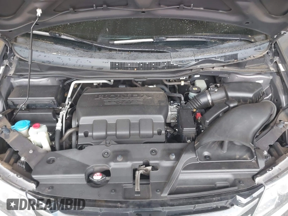 2014 Honda Odyssey EX-L with VIN 5FNRL5H6XEB060090, listed as a IAAI auction lot 41625571 with 112,762 mi miles and . Bid and sale history available at carsss.com. Image 10.