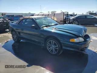 1996 Ford Mustang GT with VIN 1FALP45XXTF235504, listed as a Copart auction lot 45662595 with 57,849 mi miles and Salvage title. Bid and sale history available at DreamBid. Image 4.