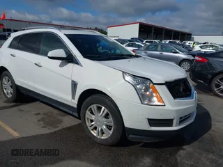 2016 Cadillac SRX Luxury Collection z VIN 3GYFNBE33GS526517, wystawiony jako IAAI lot #42378839 z przebiegiem 186 958 mil mil oraz . Historia ofert i sprzedaży dostępna na DreamBid. Obrazek 1.