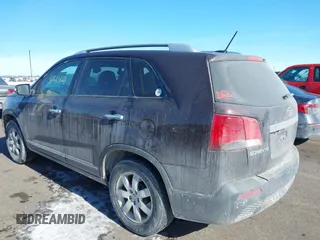 2013 Kia Sorento LX with VIN 5XYKT3A60DG379067, listed as a IAAI auction lot 41613664 with 142,651 mi miles and . Bid and sale history available at carsss.com. Image 3.