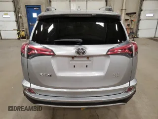 2018 Toyota RAV4 XLE with VIN JTMRFREV2JD234942, listed as a Copart auction lot 54136645 with Not Provided miles and Salvage Title. Bid and sale history available at DreamBid. Image 6.