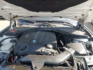 2013 BMW 3 Series 335i xDrive with VIN WBA3B9C54DF587421, listed as a IAAI auction lot 42165857 with 142,331 mi miles. Bid and sale history available at carsss.com. Image 10.