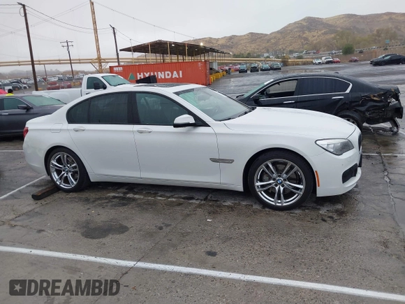 2013 BMW 7 Series 740i with VIN WBAYA6C57DC995338, listed as a IAAI auction lot 41479077 with 123,680 mi miles and . Bid and sale history available at DreamBid. Image 13.