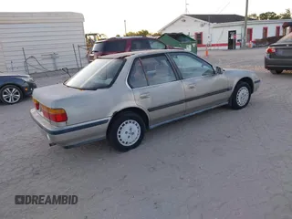 1991 Honda Accord LX with VIN JHMCB7651MC015726, listed as a IAAI auction lot 41843620 with 55,563 mi miles. Bid and sale history available at carsss.com. Image 4.
