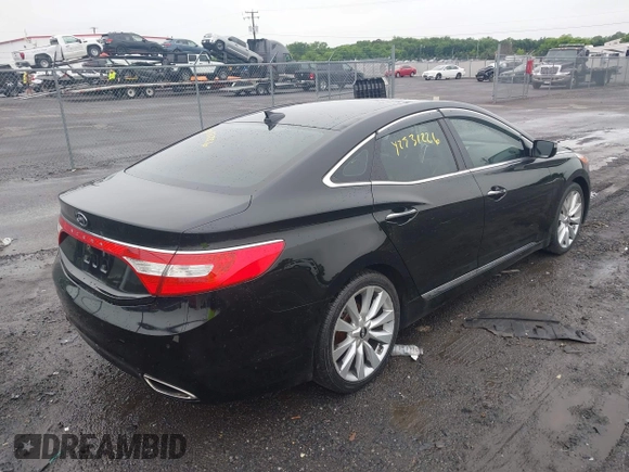 2013 Hyundai Azera z VIN KMHFH4JG5DA328645, wystawiony jako IAAI lot #42531226 z przebiegiem 82 403 mil mil oraz . Historia ofert i sprzedaży dostępna na DreamBid. Obrazek 4.