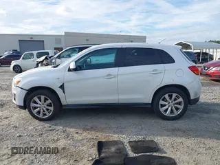 2015 Mitsubishi Outlander ES z VIN 4A4AP3AU4FE034451, wystawiony jako IAAI lot #41057102 z przebiegiem 166 263 mil mil oraz . Historia ofert i sprzedaży dostępna na DreamBid. Obrazek 14.