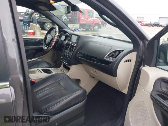 2019 Dodge Grand Caravan SXT with VIN 2C4RDGCG3KR543221, listed as a IAAI auction lot 41528859 with 129,778 mi miles and . Bid and sale history available at DreamBid. Image 5.