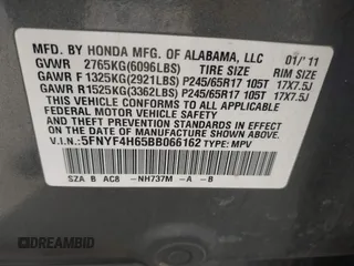 2011 Honda Pilot EX-L with VIN 5FNYF4H65BB066162, listed as a IAAI auction lot 41841588 with 387,036 mi miles and . Bid and sale history available at carsss.com. Image 9.