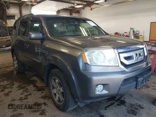 2010 Honda Pilot Touring with VIN 5FNYF4H89AB026005, listed as a IAAI auction lot 42118607 with 182,689 mi miles. Bid and sale history available at carsss.com. Image 1.