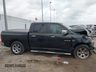 2009 Dodge 1500 SLT z VIN 1D3HV13T09S702280, wystawiony jako IAAI lot #42163173 z przebiegiem Nie podano mil oraz . Historia ofert i sprzedaży dostępna na DreamBid. Obrazek 14.