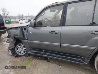 2000 Lexus LX 470 z VIN JT6HT00W8Y0092556, wystawiony jako IAAI lot #41727615 z przebiegiem 156 262 mil mil oraz . Historia ofert i sprzedaży dostępna na DreamBid. Obrazek 14.