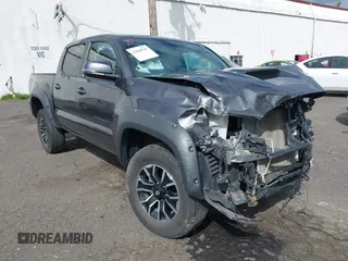 2022 Toyota Tacoma SR with VIN 3TYCZ5AN8NT058506, listed as a IAAI auction lot 42028747 with 38,027 mi miles and . Bid and sale history available at DreamBid. Image 1.