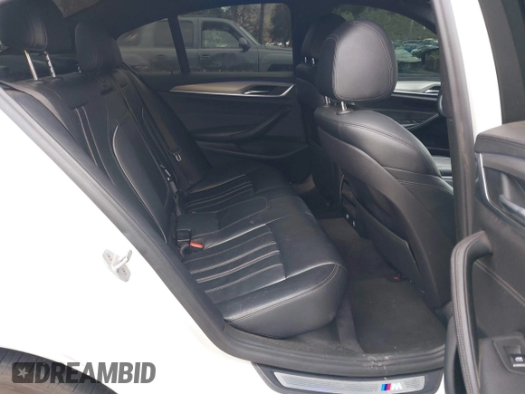 2018 BMW 5 Series 530i z VIN WBAJA5C54JG898565, wystawiony jako IAAI lot #41745230 z przebiegiem 123 776 mil mil oraz . Historia ofert i sprzedaży dostępna na DreamBid. Obrazek 8.
