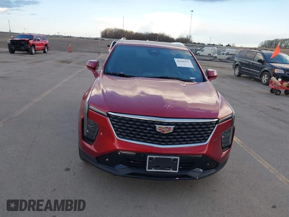 2024 Cadillac XT4 AWD Premium Luxury z VIN 1GYFZDR40RF102464, wystawiony jako IAAI lot #41968335 z przebiegiem 25 676 mil mil oraz . Historia ofert i sprzedaży dostępna na DreamBid. Obrazek 6.