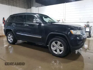 2013 Jeep Grand Cherokee Overland with VIN 1C4RJFCG7DC646348, listed as a Copart auction lot 49526415 with 137,889 mi miles and Clean Title. Bid and sale history available at carsss.com. Image 4.