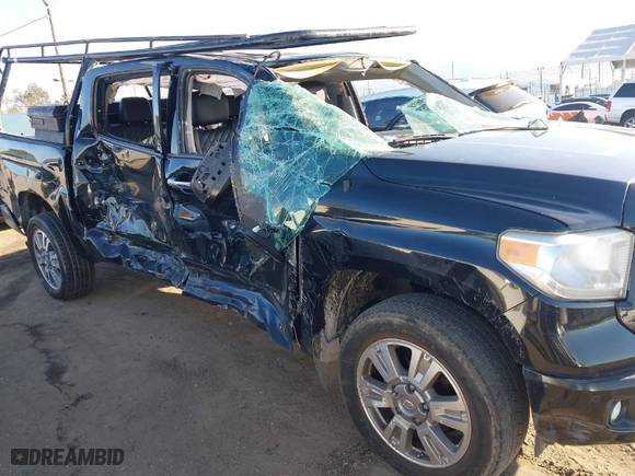 2014 Toyota Tundra 4WD Truck Platinum with VIN 5TFAY5F13EX411952, listed as a IAAI auction lot 41622110 with NaN miles. Bid and sale history available at carsss.com. Image 15.