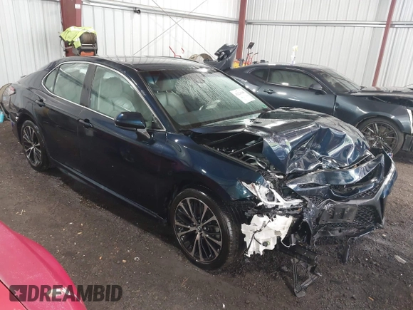 2018 Toyota Camry LE z VIN 4T1B11HK8JU517019, wystawiony jako IAAI lot #42220646 z przebiegiem 98 924 mil mil oraz . Historia ofert i sprzedaży dostępna na DreamBid. Obrazek 1.