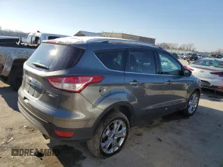 2014 Ford Escape Titanium with VIN 1FMCU9J90EUE48236, listed as a Copart auction lot 85134724 with 64,162 mi miles and Salvage Title. Bid and sale history available at carsss.com. Image 3.