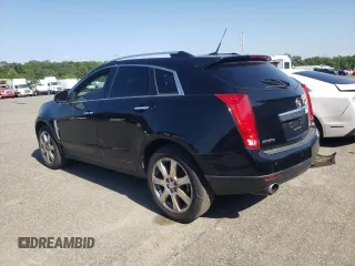 2011 Cadillac SRX Premium Collection with VIN 3GYFNFEYXBS547540, listed as a Copart auction lot 62563895 with 107,136 mi miles and Salvage title. Bid and sale history available at DreamBid. Image 2.