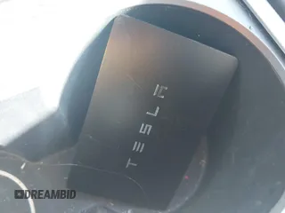 2023 Tesla Model Y Long Range with VIN 7SAYGDEE0PA202150, listed as a IAAI auction lot 41735258 with 22,131 mi miles and . Bid and sale history available at DreamBid. Image 11.