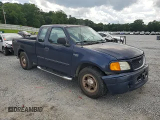 2004 Ford F-150 XL with VIN 2FTRX17234CA91750, listed as a Copart auction lot 60951485 with 243,621 mi miles and Salvage title. Bid and sale history available at DreamBid. Image 4.