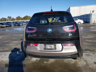 2015 BMW i3 with VIN WBY1Z4C56FV500991, listed as a Copart auction lot 43162913 with 57,885 mi miles. Bid and sale history available at carsss.com. Image 6.
