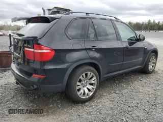 2012 BMW X5 35i z VIN 5UXZV4C5XCL752071, wystawiony jako Copart lot #56623145 z przebiegiem 180 161 mil mil oraz Czysty tytuł • Clean title. Historia ofert i sprzedaży dostępna na DreamBid. Obrazek 3.
