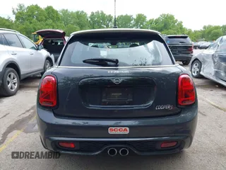 2019 MINI Hardtop 4 Door Cooper S z VIN WMWXU3C54K2H86856, wystawiony jako IAAI lot #42201474 z przebiegiem 56 610 mil mil oraz . Historia ofert i sprzedaży dostępna na DreamBid. Obrazek 16.