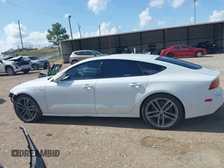 2016 Audi A7 Premium Plus with VIN WAUWGAFC2GN021696, listed as a IAAI auction lot 42595234 with 112,464 mi miles and . Bid and sale history available at DreamBid. Image 14.