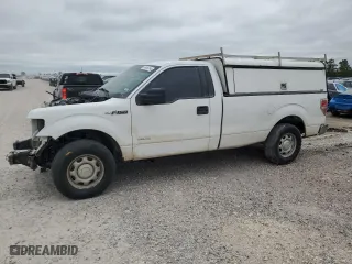 2014 Ford F-150 XL with VIN 1FTNF1CT3EKE02302, listed as a Copart auction lot 69056354 with 203,763 mi miles and Salvage Title. Bid and sale history available at carsss.com. Image 1.