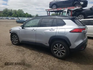 2024 Toyota Corolla Cross Hybrid S z VIN 7MUFBABG5RV034536, wystawiony jako Copart lot #56297535 z przebiegiem 26 655 mil mil oraz Szkoda całkowita • Salvage title. Historia ofert i sprzedaży dostępna na DreamBid. Obrazek 2.