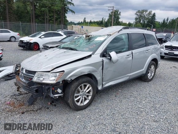 2013 Dodge Journey SXT with VIN 3C4PDDBG1DT507356, listed as a IAAI auction lot 42592501 with 128,094 mi miles and . Bid and sale history available at DreamBid. Image 2.