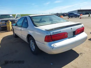 1996 Ford Thunderbird LX with VIN 1FALP62W3TH135238, listed as a IAAI auction lot 41692746 with 136,464 mi miles and . Bid and sale history available at DreamBid. Image 3.